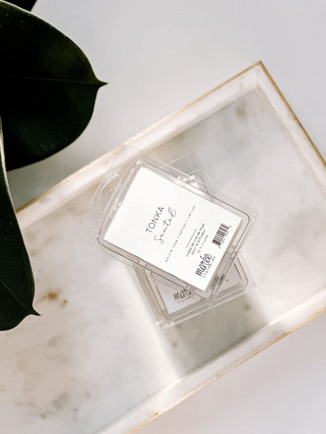 Pastilles de cire de soya Tonka Santal dans un emballage recyclable
